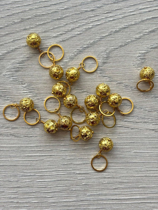 Golden lava rock stitch marker